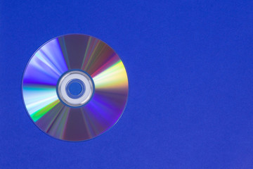 DVD disc is the reverse side on a blue background. Rainbow.