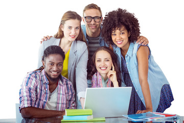 Fashion students working as a team  against white background with vignette