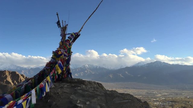 Buddhist colorful prayer flags blow by the wind in the mountains at Leh, Ladakh, India