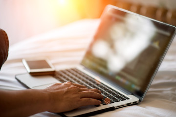 Young man working with laptop