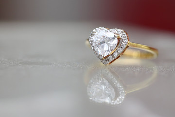 Diamond heart on gold ring