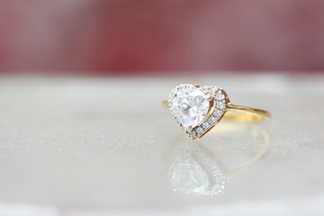 Diamond heart on gold ring