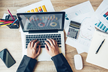 Business women workplace with laptop. close up hands on a keyboard.Top view,Workplace strategy Concept.