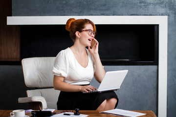 Young woman working in the office