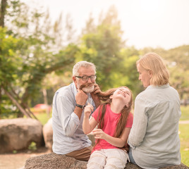 happy family playing in garden park