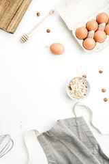 Food ingredients on white background. Cooking flat lay, top view concept.