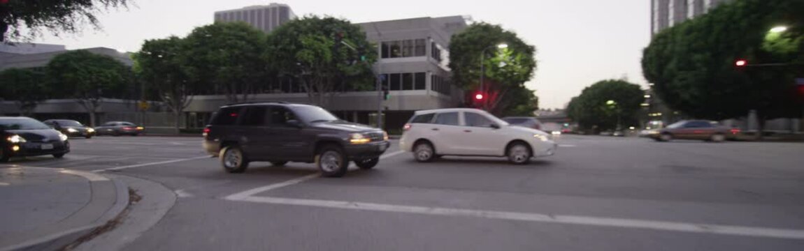 Rear view of a Driving Plate: Car turns right from Figueroa Street in Los Angeles to enter the 2nd Street tunnel, continues on 2nd Street to turn right onto Spring Street, and travels on Spring Street to 3rd Street.