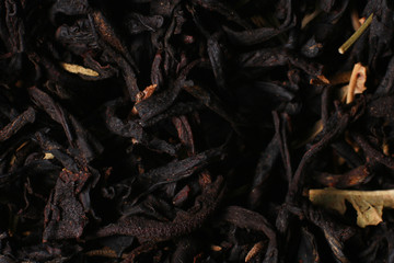 Black tea texture. Dry black sheet tea.