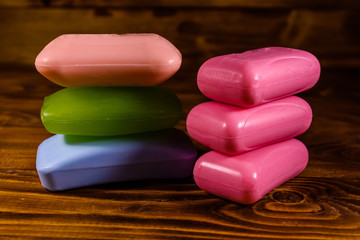 Pieces of the soap on wooden table