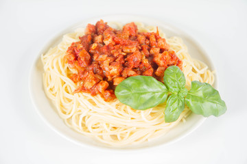 Spaghetti bolognese on a white background