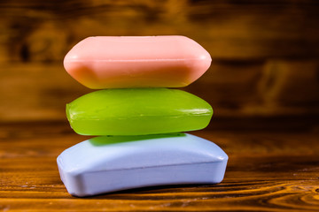 Pieces of the soap on wooden table