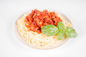 Spaghetti bolognese on a white background