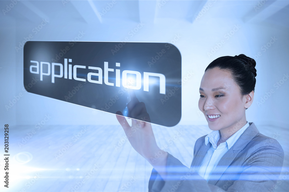 Poster Businesswoman pointing to word application against big room with white wall