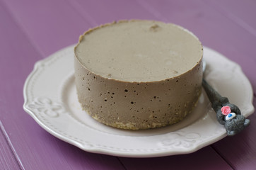 Cheesecake with carob nuts chocolate sauce and agar