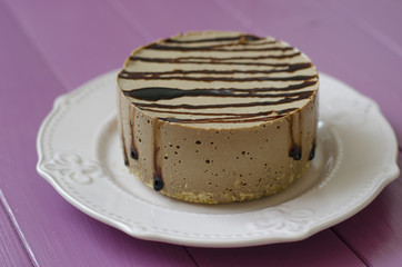 Cheesecake with carob nuts chocolate sauce and agar