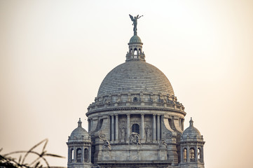 The landmark Victoria Memorial is a large marble building in Kolkata, West Bengal, India. It is...