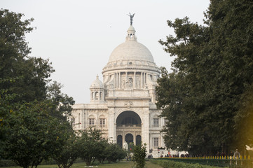 Fototapeta premium The landmark Victoria Memorial is a large marble building in Kolkata, West Bengal, India. It is dedicated to the memory of Queen Victoria.