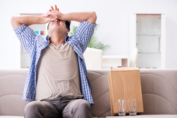 Man receiving wrong parcel with glasses