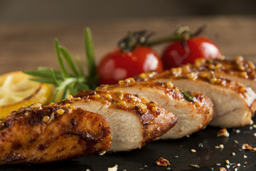 roasted chicken fillet breast with lemon tomato rosemary mustard seeds honey
