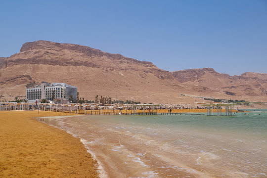 Coast and the Dead Sea beach in resort district Ein Bokek, Israel