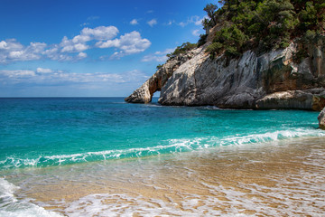 paradise beach with turquoise water, hidden bay