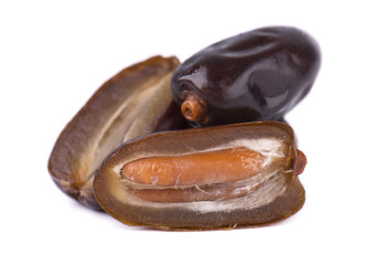 Dates fruit isolated on white background. Dates with a half. Close-up