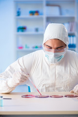 Lab assistant testing blood samples in hospital