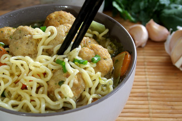 Meatball noodle soup. Selective focus
