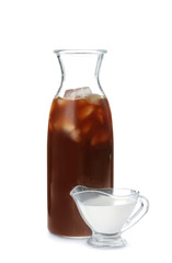Bottle with cold brew coffee and cream on white background