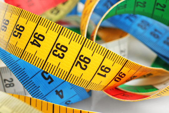 Different measuring tapes, closeup
