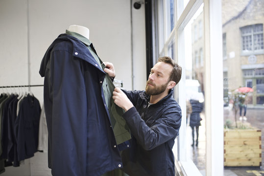 Portrait of a male fashion retailer