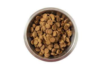 Dogs or cats dry food in a metal bowl isolated on white background, top view