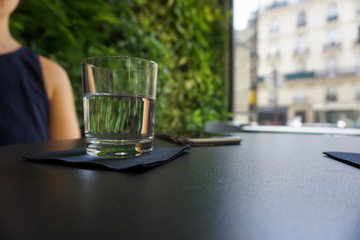 Water glass in the best coffee place in Paris
