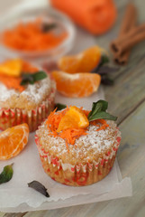 Carrot Healthy Muffins Cupcakes Buns on a WoodenRustic board. Homemade Food.