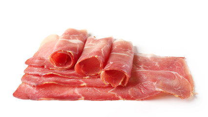 prosciutto slices on a white background