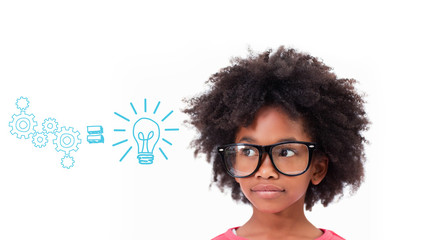 Cute pupil wearing glasses against idea and innovation graphic