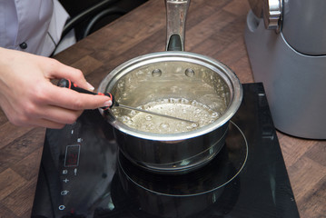 caramel cooking saucepan on the table in the kitchen