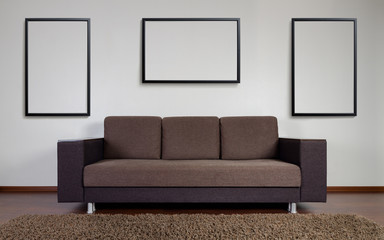 Modern couch with wall decoration frames