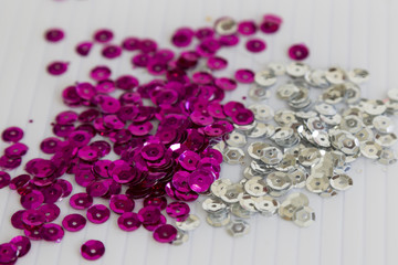 pink and white bead on the white background.