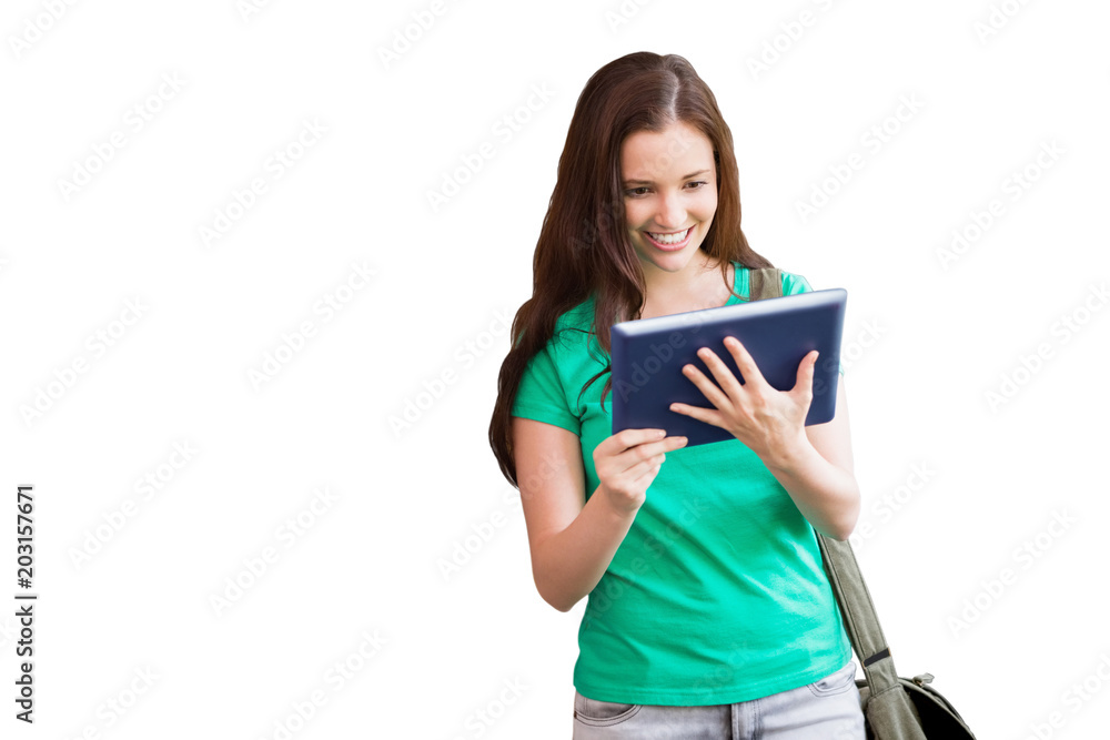 Poster student using her tablet in library against white background with vignette