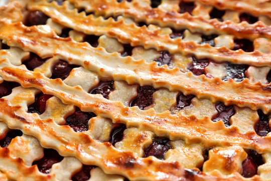 Delicious cherry pie with lattice top, closeup