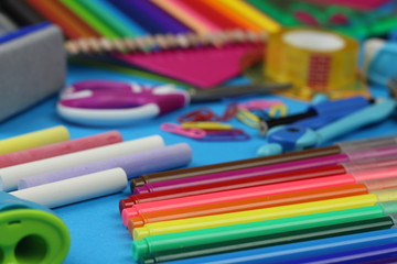 School supplies on a blue background