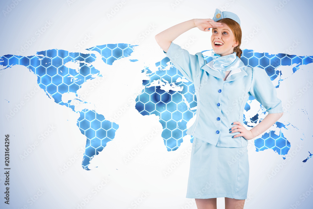 Poster pretty air hostess looking up against background with hexagons and world map