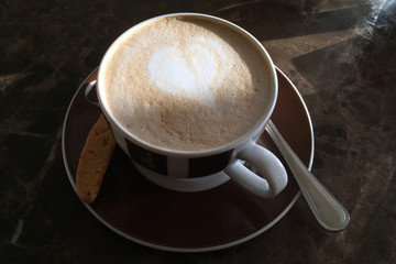 Cup of Cappuccino with a Heart in the Foam