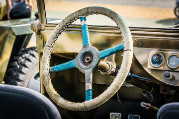Old steering wheel in the war machine