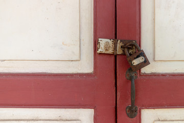 old door Wooden cabinet with security the old key lock.