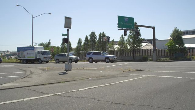 Left Front Three Quarter view of a Driving Plate: Car turns left onto Vaughn Street in Portland, Oregon and transitions onto onramp to I-405 South. It continues on I-405 to Exit 1C, stops at light and turns left onto 6th Avenue.