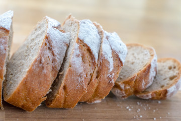 Close up sliced bread put on wooden surface