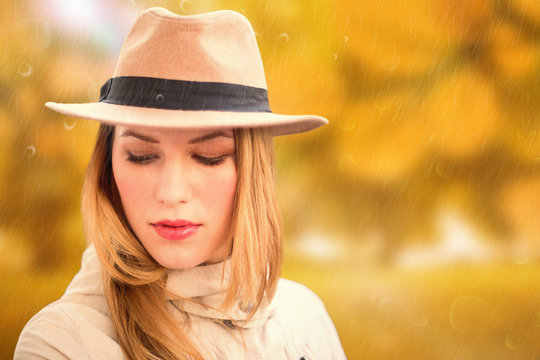 Pretty hipster blonde against autumn scene