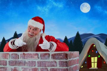 Portrait of happy Santa Claus making hand gesture over wall against winter snow scene